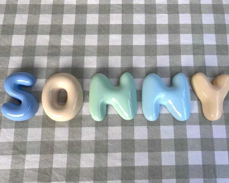 Hand-finished bubble letters in a child's room
